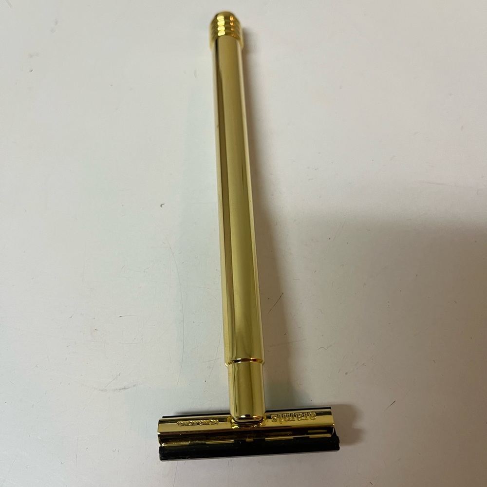 Aramis gold shaver